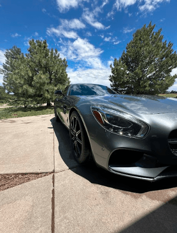 Detailing work on a parked car