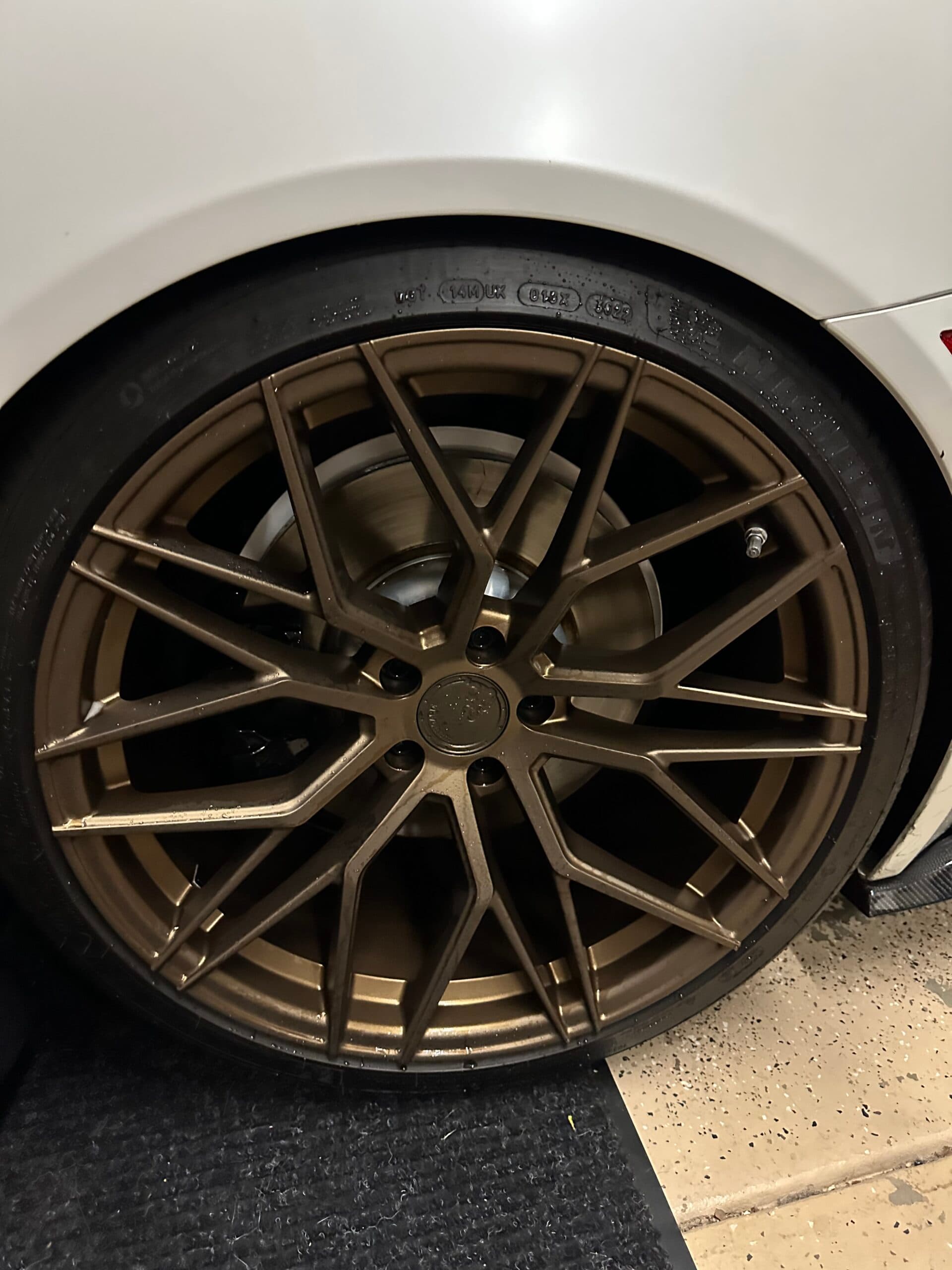 Close-up of a freshly detailed wheel and tire